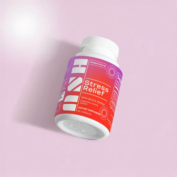 Tilted Ashwagandha supplement bottle — calming adaptogen support